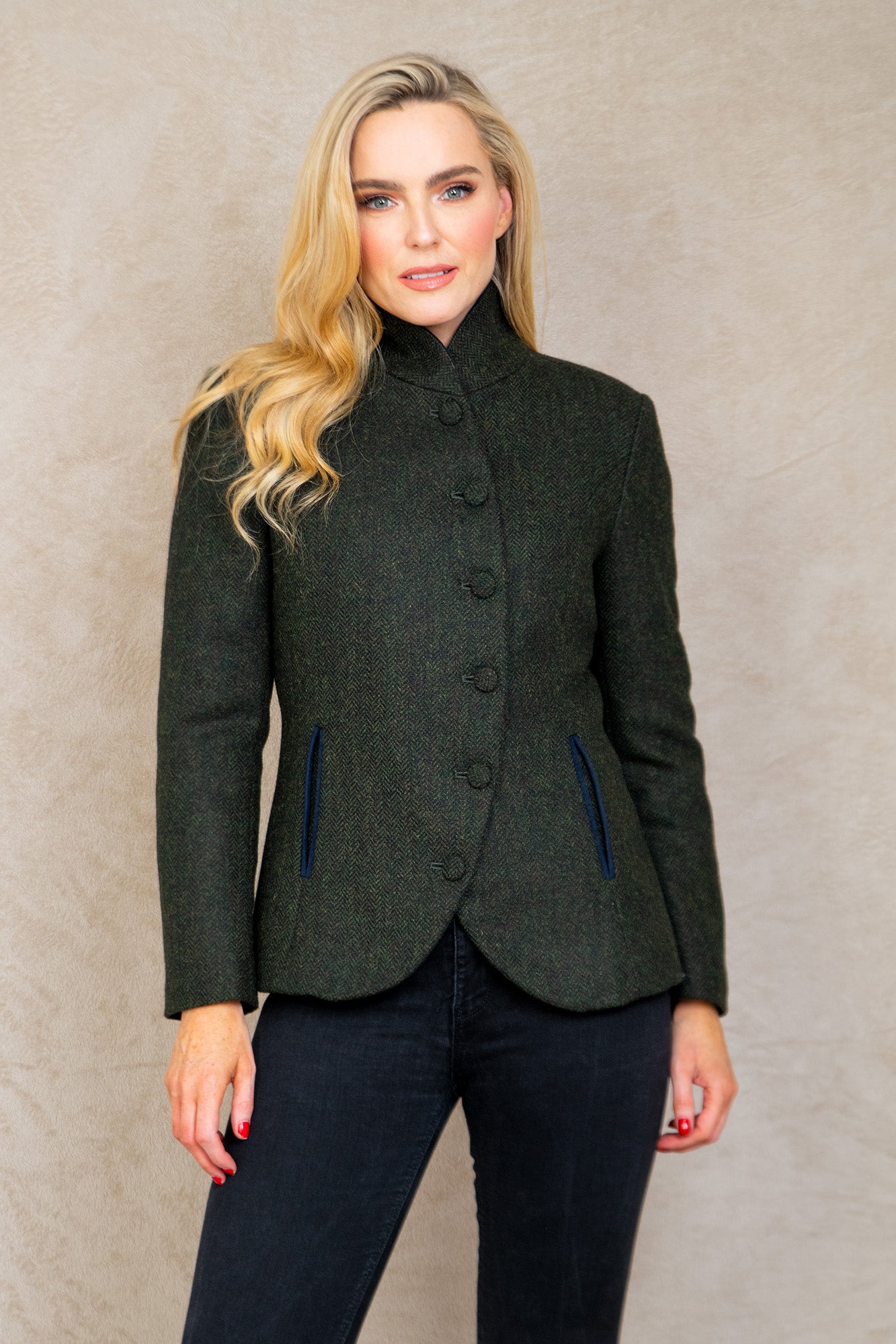 Woman in green Nicole tweed jacket