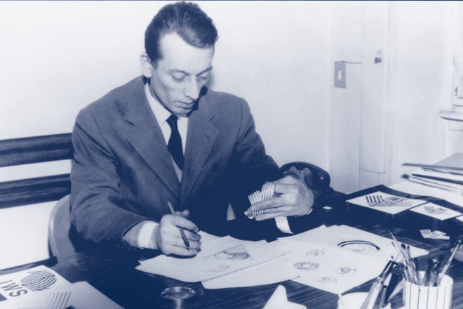 Francesco Saroglia - designer at work crafting the merino wool Woolmark certified logo 